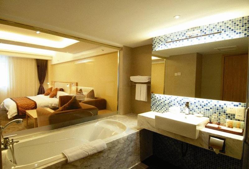 גואנגג'ואו Jian Li Harmony Hotel חדר תמונה